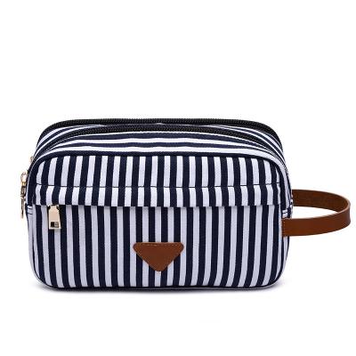 China New Fashion Stripe Canvas Travel Toiletry Bag With Zipper Pocket Eco-Friendly Compartment Canvas Cosmetic Bags for sale