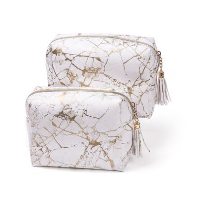 China Large Capacity Personalized Marble Leather Cosmetic Bag Travel Clutch PU Marble Makeup Bag With Tassel for sale