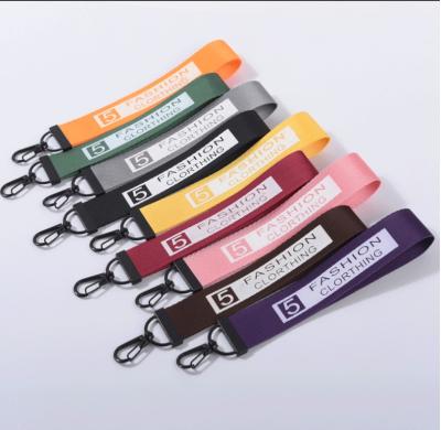 China MATEL+WEBBING metal bag key chain letter ribbon key chain fashion popular pendant creative tide brand for sale