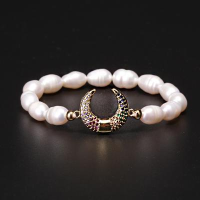 China Women Trendy Natural Designs Cultured Pearl Fashion Stretch Charm Freshwater Pearl Bracelet for sale