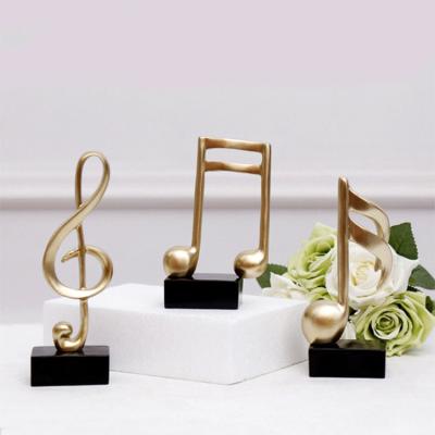 China Europe Home TV Cabinet Decoration Resin Music Desktop Trophy Ornaments Stave Music Symbol Piano Room Statue Figurines Modern Crafts for sale