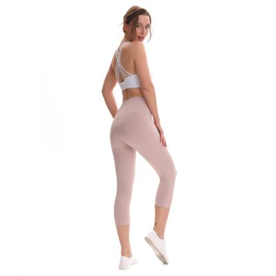 China UGOO Fitness Yoga Sports Breathable High Waist Capri Legging Elastic Quick Dry Pants With Pocket for sale