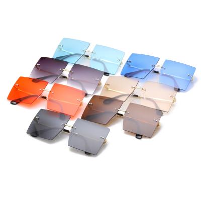 China New 2021 UV Stopping Collection Shape Rimless Temples Metal Lady Rectangular Shade Sunglasses for sale