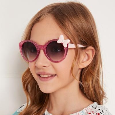 China Lovely New Classic Retro Round Frame Bowknot Kids Shading Ocean Lens Sunglasses Wholesale for sale