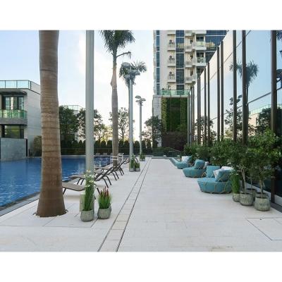 China Contemporary Flamed Natural Stone Paving Tiles White Granite Pavers Around Swimming Pool for sale