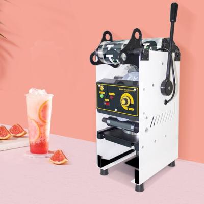 China Handheld 300W Juice Bubble Tea Sealing Machine 90mm/95mm Food FEST Manual Paper Cup Sealer 220V/110V for sale