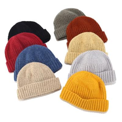 China Custom Wholesale Colorful Adult High Quality COMMON Logo Winter Fisherman Skull Beanie Hat for sale