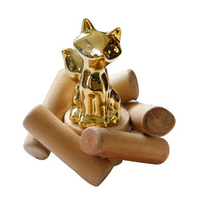 China Fine Art Craft Porcelain Mini Fox China Desktop Ceramic Gold Ornaments Display With Wooden Base Gifts For Kids for sale