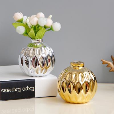 China Cheap Tabletop Luxury Plating Flower Vases Desktop Living Room Porcelain Gold Silver Ceramic Vases Hard Small For Home Decor for sale