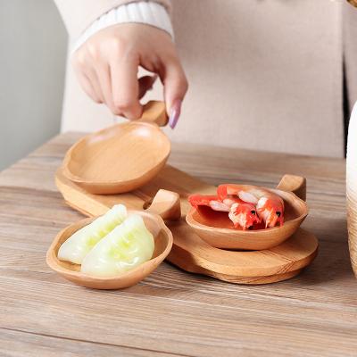 China Household Sustainable Solid Dish Wooden Rack Kitchen Utensils Small Soy Sauce Seasoning Dish With Handle for sale