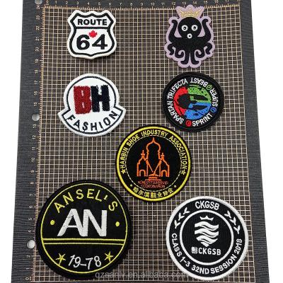 China 3D Machine Embroidery Luxury Apparel Label Patches Woven Patch for sale