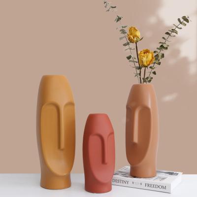 China New design red face ceramic figure body vase in flower arrangement vase minimalist matte ceramic home decor for sale