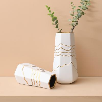 China Nordic Modern Minimalist Light Luxury Electroplating Flower Arrangement Vase Decoration Ceramic Simulation Wave Art Vase for sale