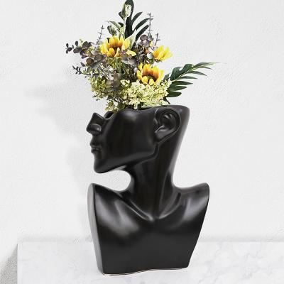 China Minimalist wholesale creative decoration ceramic body face human white vase for sale for sale