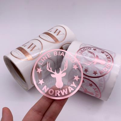 China Custom Round Adhesive Waterproof Foil Glossy Logo Gold Sticker Labels Transparent Business Stickers for sale