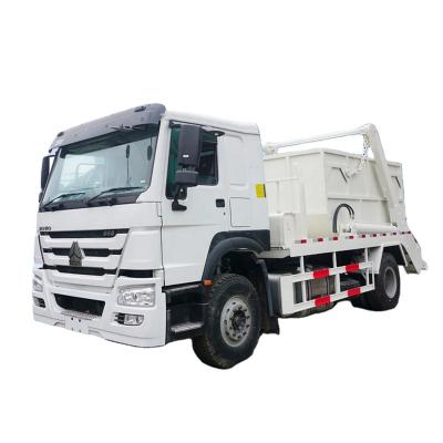 Cina Hotels most popular howo 4x2 hydraulic swing arm roll garbage truck 10cbm pop up lifting trash can vehicle for sale in vendita