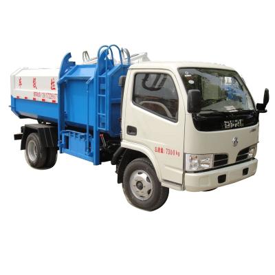 China Factory price Dongfeng diesel type 4x2 mini size 4cbm hotels mini side loading collecting bin garbage truck for sale à venda