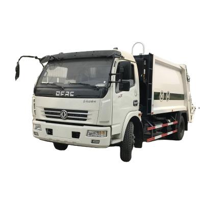 China China DFAC 8m3 garbage compactor truck for hotels 5 ton compactor garbage truck à venda