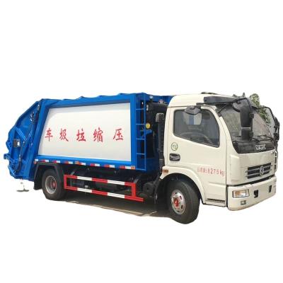 China China DFAC 8m3 garbage compactor truck for hotels 5 ton compactor garbage truck price à venda