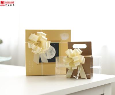 China Luster Wholesale pom pom satin pull bow for wedding decoration gift ribbon bow for sale