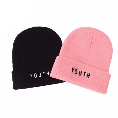 China COMMON Winter Hat Letters Jacquard Knitted Beanie Hat Embroidery Logo Acrylic American Football Beanie for sale