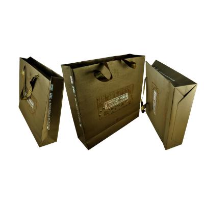 China Recycled Materials Customized Low Cost Handle Flatbed Outdoor Handling Paper Bag for sale