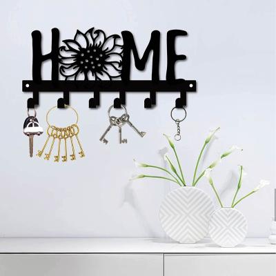 China Minimalist Home Metal Main Rack For Decorative Wall Mounted Ruffle Key Holder Towels Hanger For Home Bathroom Front Door Kitchen Decor for sale