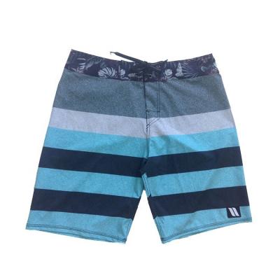 China Breathable Unique Design Polyester Man Cool Stripe Panel Shorts Wholesale Fashion Colorful Mens Surf Shorts for sale