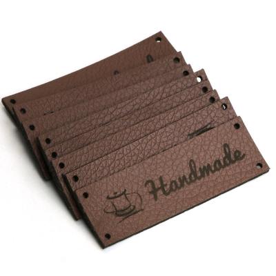 China Personalized Custom PU Leather Tag Labels With Text And Symbol for Clothing zu verkaufen