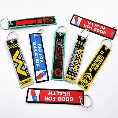 China Customized Blank Printing Alphabet Letter Double Sided Key Chains Woven Embroidered Keychain Short Lanyard Key Tags for sale