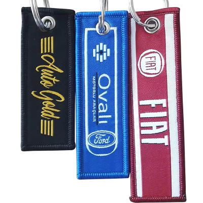 China Customization Personalized Woven Key Tag Shining Charm Soft Metal Keychains for sale