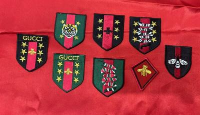 China Merrow Border Gucci Embroidery Patches 7 Pcs Set Iron On Backing for sale