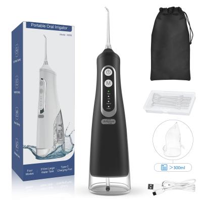 China 2021 Portable Electric Toothbrush Wireless Tap Oral Hygiene 300ml Oral Hygiene Dental Water Flosser for sale