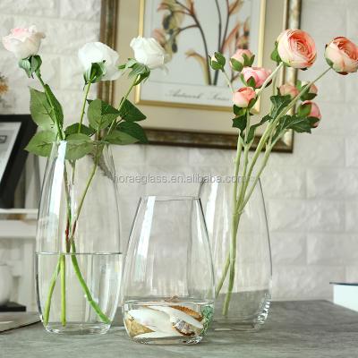 China Wholesale Eco-friendly Transparent Shell Glass Fashion Glass Bottle Vase Porcelain Simple Design for sale