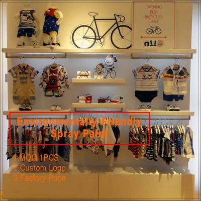 Китай Kids clothing kiosk design with clothing display racks продается