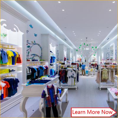 中国 Customized nice design fashion white wooden kids clothing store interior design,kids baby shop design decoration 販売のため