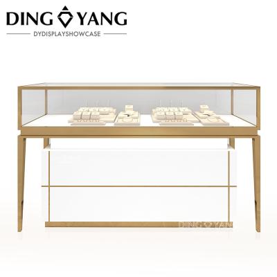 China High End Large Jewelry Display Case For Jewelry Store, Golden Hairline Stainless Steel And Ultra-Clear Tempered Glass for sale