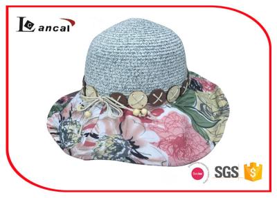 China Flower wavy wide brimmed straw hat with customized hatband and sweatband for sale