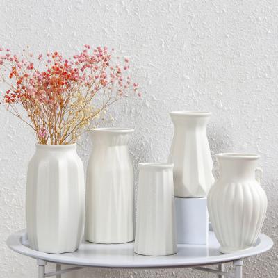 China Home Decorations Matt White Ceramic Irregular Art Plant Vase Decor Abstract Minimalist Porcelain Antique Indoor Vases for sale