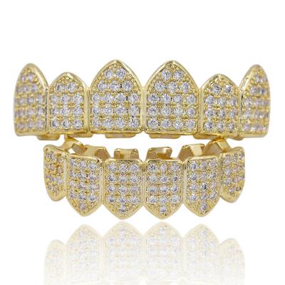 China Romantic Hip Hop Grills Teeth Grillz Gold Color Plated Tooth Grillz High Quality Micro Pave CZ Top and Lower GRIL Mouth Teeth Grills Sets for sale