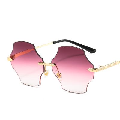 China Anti UV400 2021 New Irregular Rimless Sunglasses Women Personality Eight-sided Irregular Polygon Sunglasses for sale