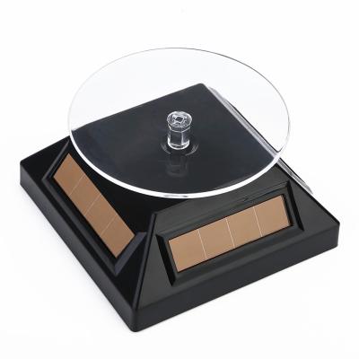 China 360 the diameter of the left and right rotation 10cm degree 360 ​​degree display turntable can support the solar powered rotating turntable for makeup, earring and jewelry for sale