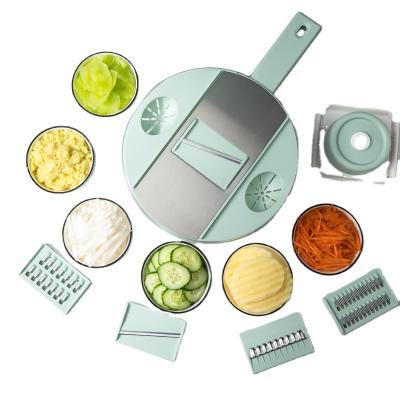 China Multifunctional Manual Food Chopper Vegetable Slicer Cheese Grater Sustainable ABS+PET Vintage with Container for sale