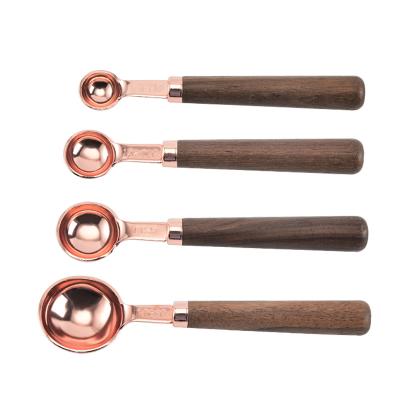 China Sustainable Gauge Tools Size 4 Food Grade Rose Gold Stainless Steel Cake Baking Tool Tool Sets With Wooden Handle for sale