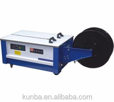 China Manual Electric Food KUNBA Type Strapping Carton Packing Machine With Plastic for sale