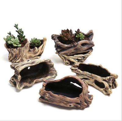 China New CLASSIC Creative Cement Tree Root Carving Mini Pastoral Flowerpot Succulents Basin Reusable Flower Planter Stump Flower Pot for sale