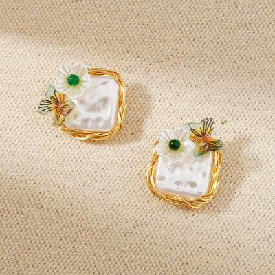 China Hiphop Small Pearl 925 Sterling Silver Earrings Fresh Wild ISS Butterfly Flower Handcrafted Wrapped Earrings for sale