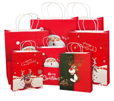 China Colorful Christmas Recyclable Gift Paper Bags For Gifts Vellum Paper Kids Gift Bag for sale