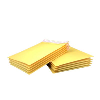 中国 Delivery Package Wholesale Kraft Paper Bubble Mailer Padded Envelope Yellow Shipping Bag 販売のため