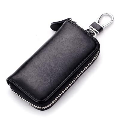 China Fashion Car Key Case Smart Car Key Chain Holder Genuine Leather Metal Key Chain Hook Holder and Key Ring Zipper Wallet Bag for sale